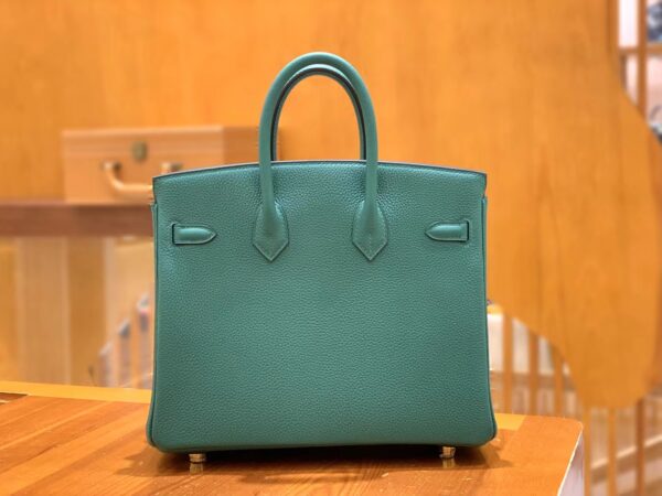 Make a statement with this stunning 30cm Malachite Togo Birkin