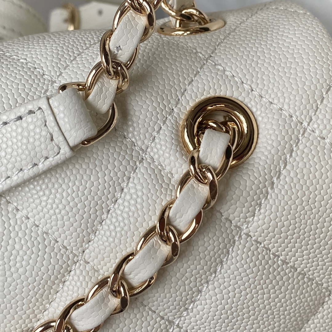 Chanel 22 mini handbag, Metallic calfskin & pink gold-tone metal, copper —  Fashion